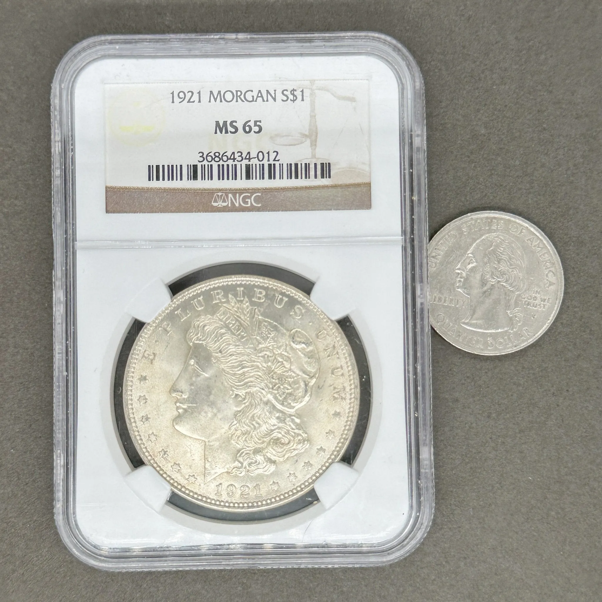 Estate 0.900 Fine Silver 1921 $1 Morgan Dollar NGC MS65