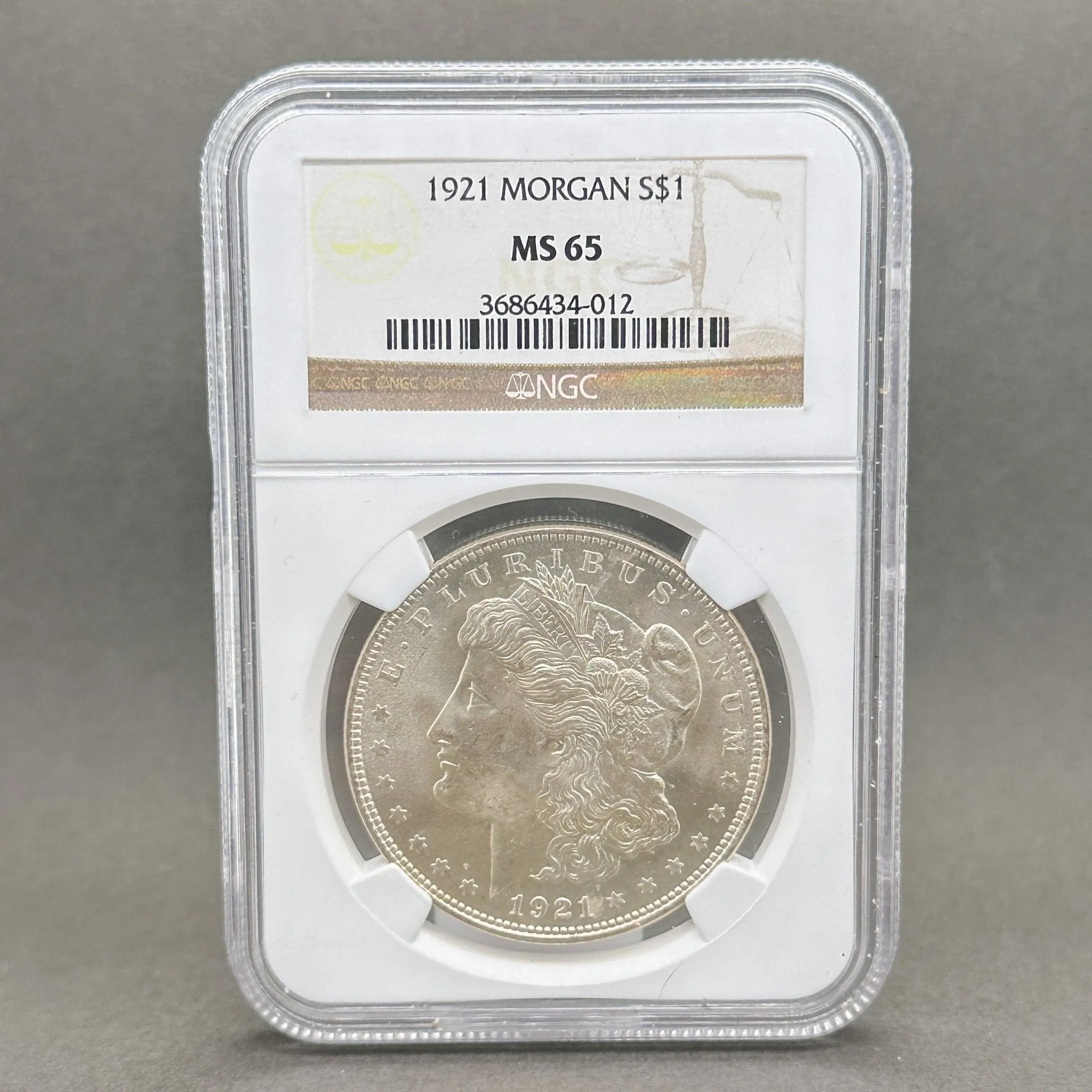 Estate 0.900 Fine Silver 1921 $1 Morgan Dollar NGC MS65