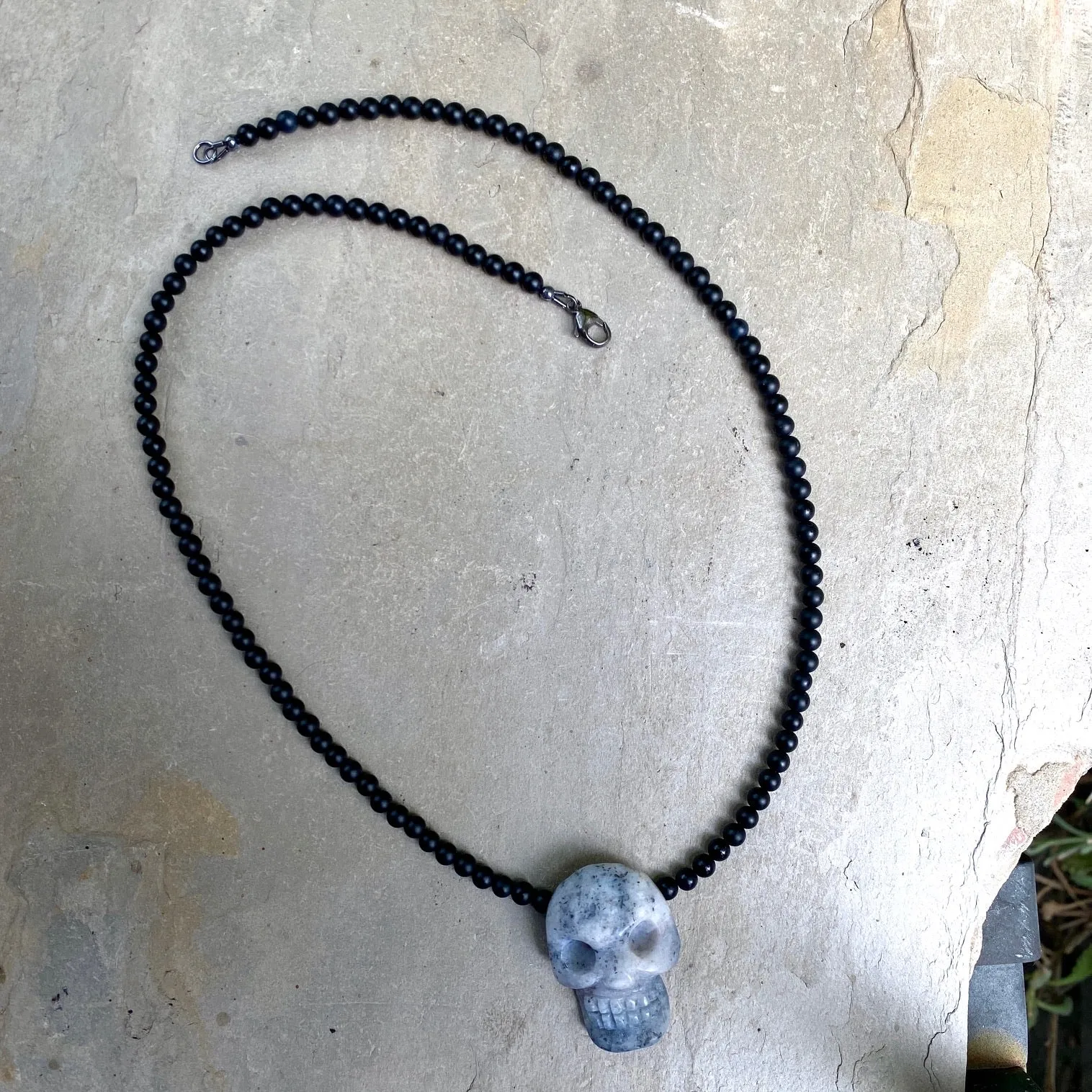 Ice Blue Agate skull w/ Onyx and Sterling Silver Clasp