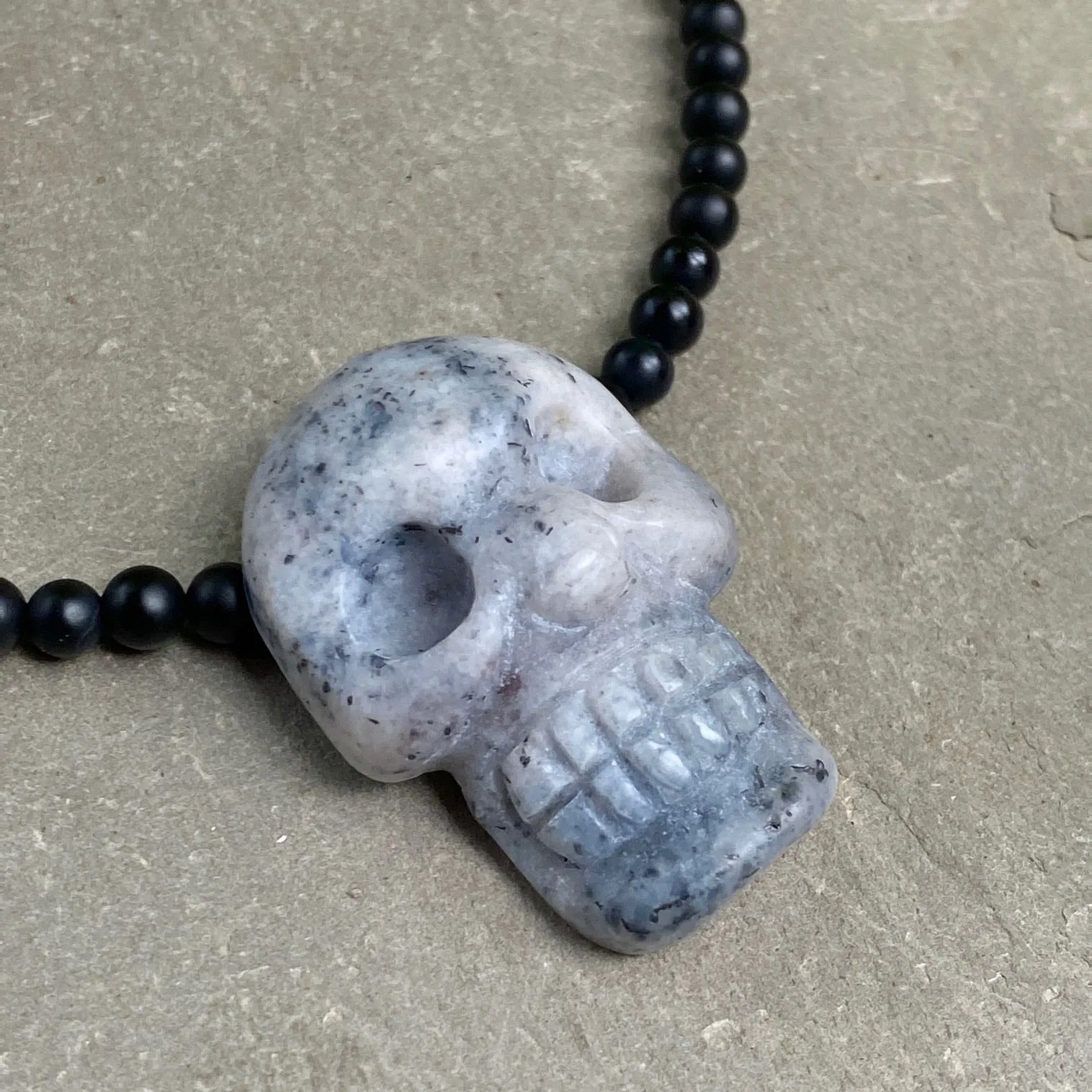 Ice Blue Agate skull w/ Onyx and Sterling Silver Clasp