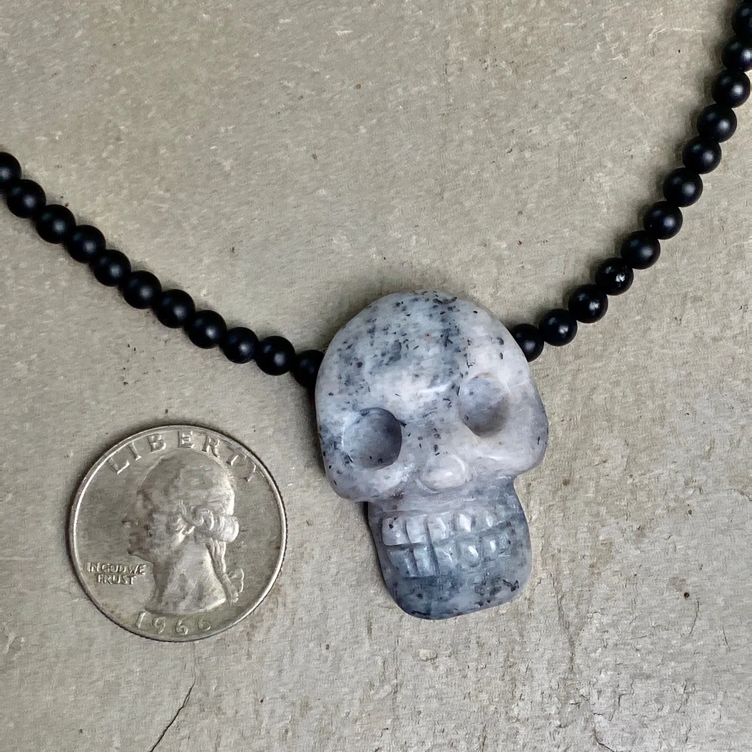 Ice Blue Agate skull w/ Onyx and Sterling Silver Clasp