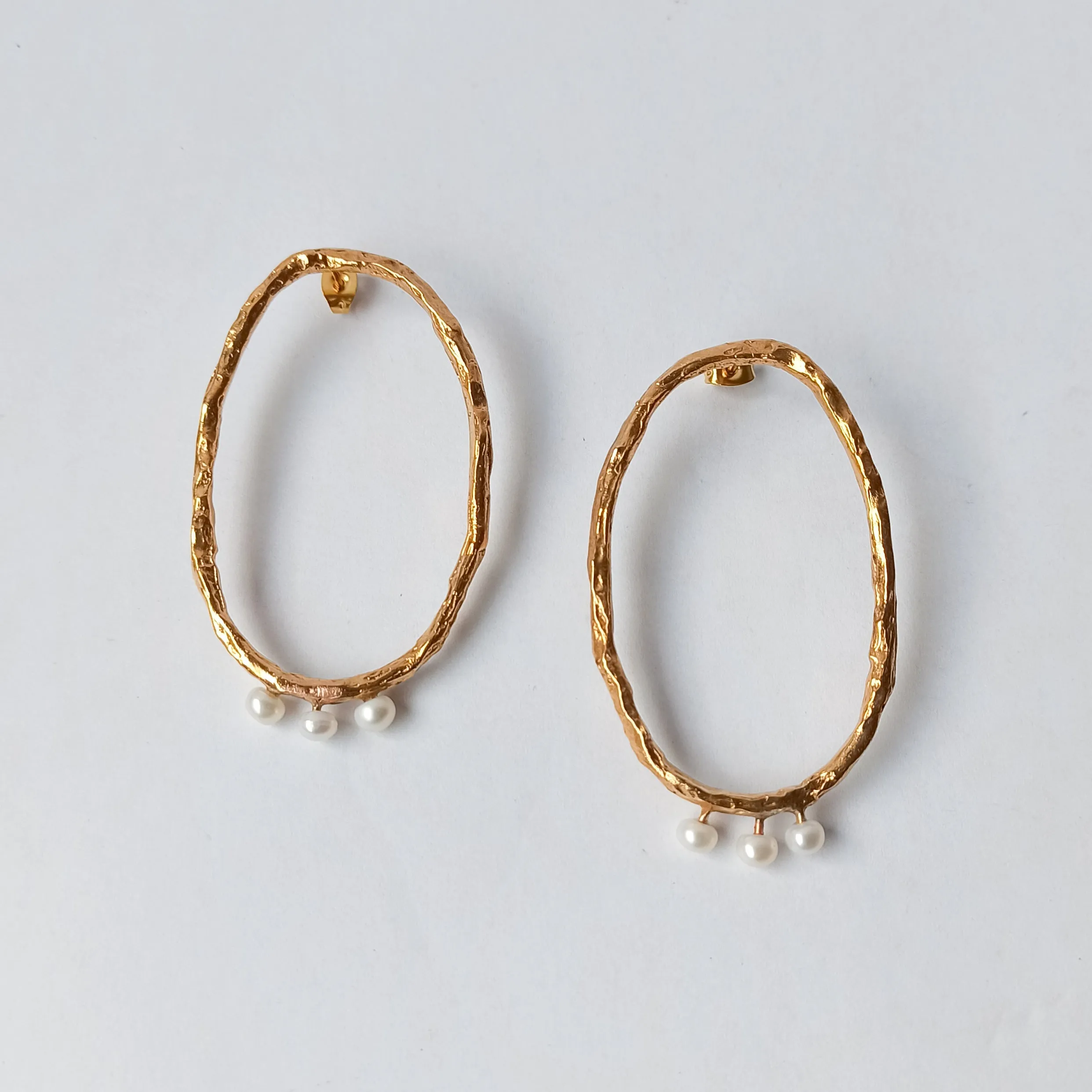 Pearl and gold earrings