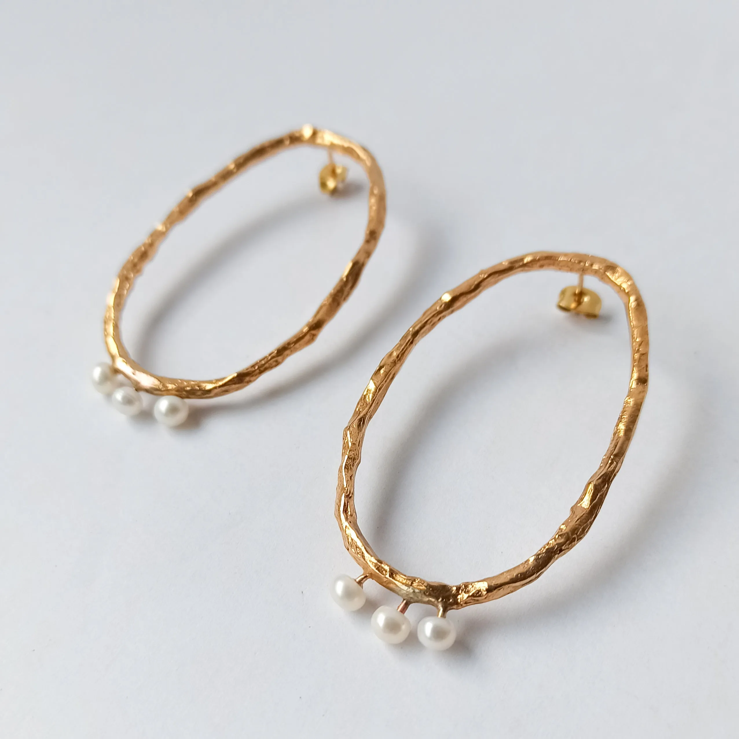 Pearl and gold earrings