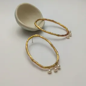 Pearl and gold earrings